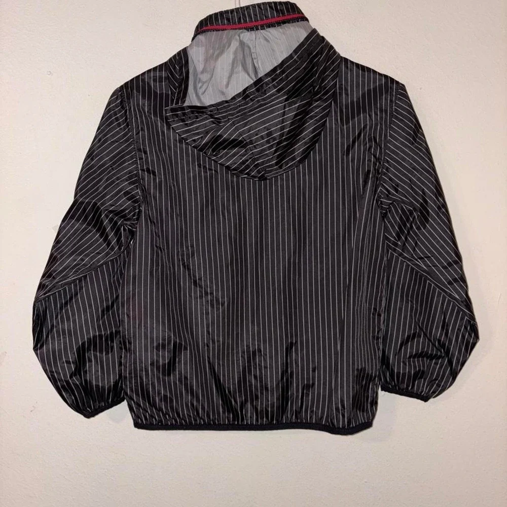 Old Navy black with white vertical pinstripe windbreaker jacket in a small